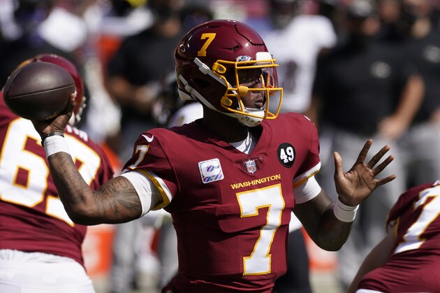 Washington Football Team quarterback Dwayne Haskins (7) tosses a pass during the first half of the Baltimore Ravens Washington Football team NFL football game Sunday, Oct. 4, 2020, in Landover, Md. (AP Photo/Steve Helber)