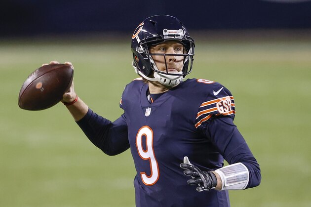 Chicago Bears quarterback Nick Foles (9) looks to pass the ball against the Tampa Bay Buccaneers during the second half of an NFL football game, Thursday, Oct. 8, 2020, in Chicago. (AP Photo/Kamil Krzaczynski)