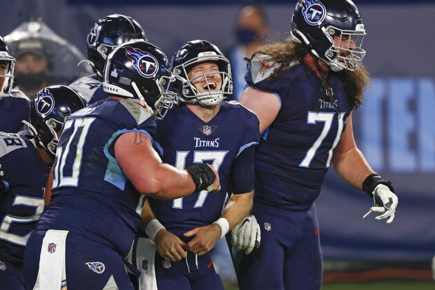 Tennessee Titans quarterback Ryan Tannehill (17) celebrates after scoring a touchdown on a 10-yard run against the Buffalo Bills in the first half of an NFL football game Tuesday, Oct. 13, 2020, in Nashville, Tenn. (AP Photo/Wade Payne)