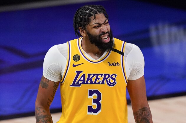Los Angeles Lakers forward Anthony Davis plays against the Miami Heat during the second half in Game 4 of basketball's NBA Finals Tuesday, Oct. 6, 2020, in Lake Buena Vista, Fla. (AP Photo/Mark J. Terrill)