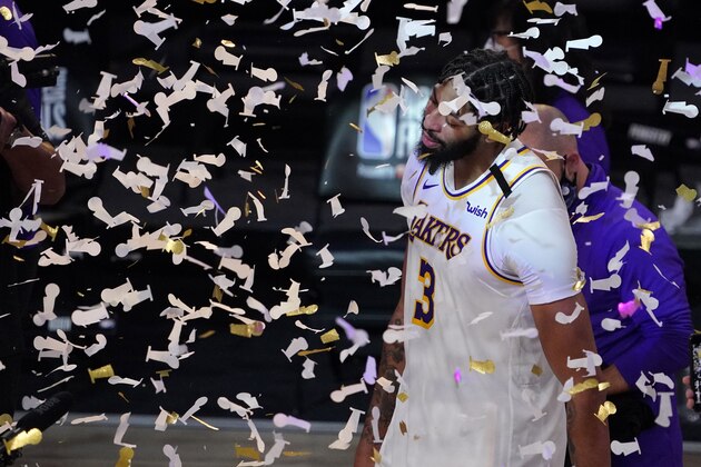 Los Angeles Lakers' Anthony Davis (3) celebrates after the Lakers defeated the Miami Heat 106-93 in Game 6 of basketball's NBA Finals Sunday, Oct. 11, 2020, in Lake Buena Vista, Fla. (AP Photo/Mark J. Terrill)