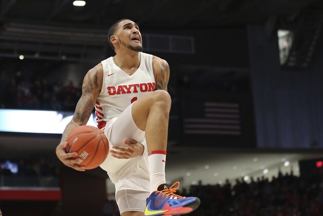 Dayton's Obi Toppin goes up to dunk during the second half of an NCAA college basketball game against George Washington, Saturday, March 7, 2020, in Dayton, Ohio. (AP Photo/Tony Tribble)