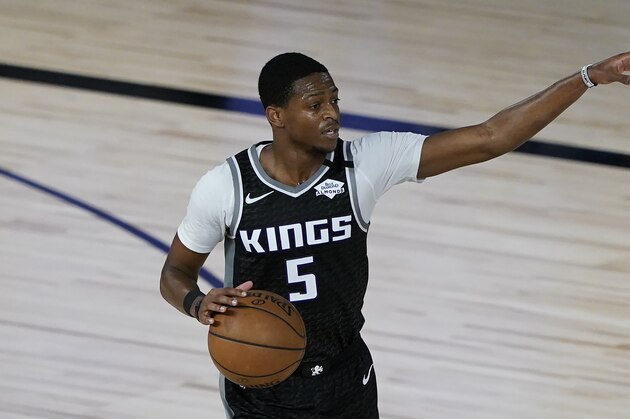 Sacramento Kings' De'Aaron Fox (5) looks for a pass during an NBA basketball game against the New Orleans Pelicans Thursday, Aug. 6, 2020, in Lake Buena Vista, Fla. (AP Photo/Ashley Landis, Pool) Sacramento Kings' De'Aaron Fox (5) looks for a pass during an NBA basketball game against the New Orleans Pelicans Thursday, Aug. 6, 2020, in Lake Buena Vista, Fla. (AP Photo/Ashley Landis, Pool)