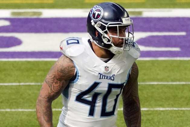Tennessee Titans safety linebacker Kamalei Correa defends against the Minnesota Vikings in an NFL football game, Sunday, Sept. 27, 2020, in Minneapolis. (AP Photo/Jim Mone)