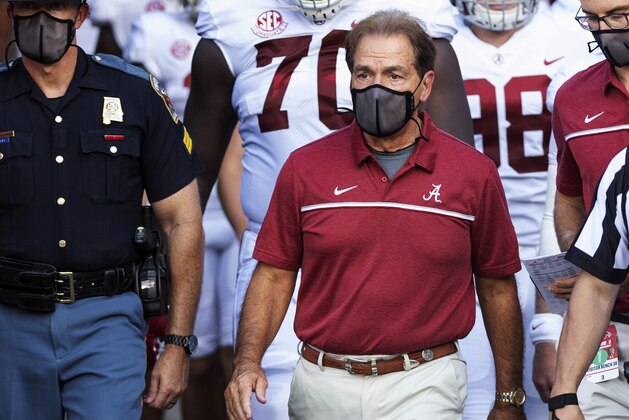 FILE - In this Sept. 26, 2020, file photo, Alabama coach Nick Saban leads his team to the field before an NCAA college football game against Missouri in Columbia, Mo. New Mississippi coach Lane Kiffin faces his old boss, Nick Saban, when the Rebels host No. 2 Alabama on Saturday. Saban last week improved to 20-0 when facing teams led by one of his former assistants. By(AP Photo/L.G. Patterson, File)