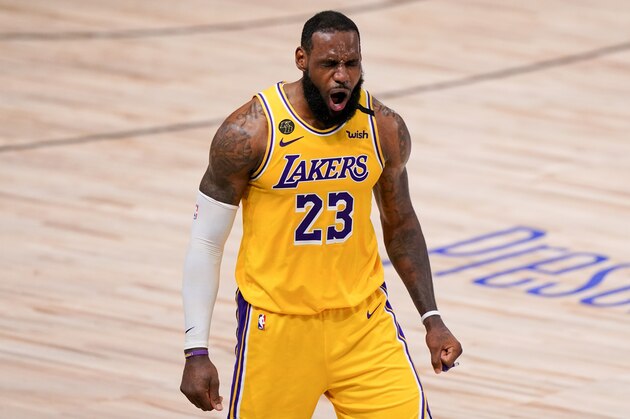 Los Angeles Lakers forward LeBron James plays against the Miami Heat during the second half in Game 4 of basketball's NBA Finals Tuesday, Oct. 6, 2020, in Lake Buena Vista, Fla. (AP Photo/Mark J. Terrill)