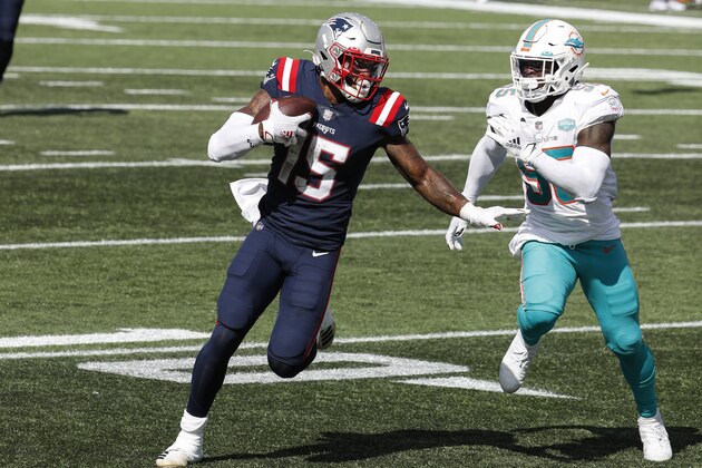 New England Patriots wide receiver N'Keal Harry runs the ball against Miami Dolphins outside linebacker Jerome Baker during an NFL football game at Gillette Stadium, Sunday, Sept. 13, 2020 in Foxborough, Mass. (Winslow Townson/AP Images for Panini)