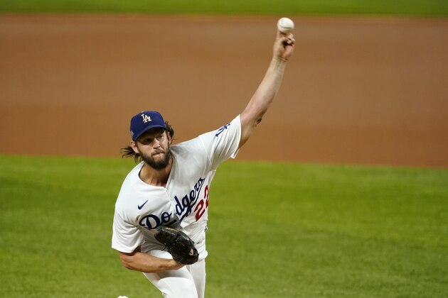 Los Angeles Dodgers starting pitcher Clayton Kershaw works against the San Diego Padres in Game 2 of a baseball National League Division Series Wednesday, Oct. 7, 2020, in Arlington, Texas. (AP Photo/Tony Gutierrez)
