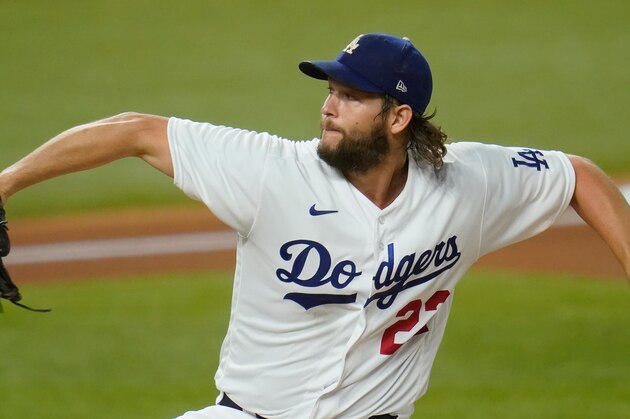 Los Angeles Dodgers starting pitcher Clayton Kershaw delivers during the first inning in Game 2 of a baseball National League Division Series Wednesday, Oct. 7, 2020, in Arlington, Texas. (AP Photo/Sue Ogrocki)