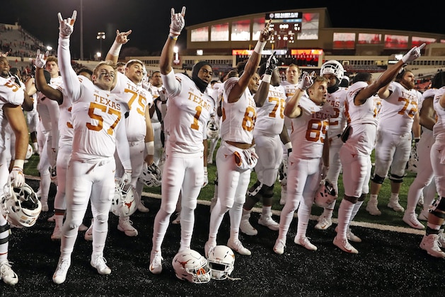 FILE - In this Nov. 10, 2018, file photo, Texas players sing