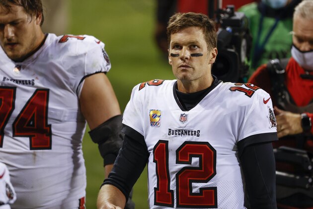 Tampa Bay Buccaneers quarterback Tom Brady (12) walks off the field after an NFL football game against the Chicago Bears, Thursday, Oct. 8, 2020, in Chicago. (AP Photo/Kamil Krzaczynski)