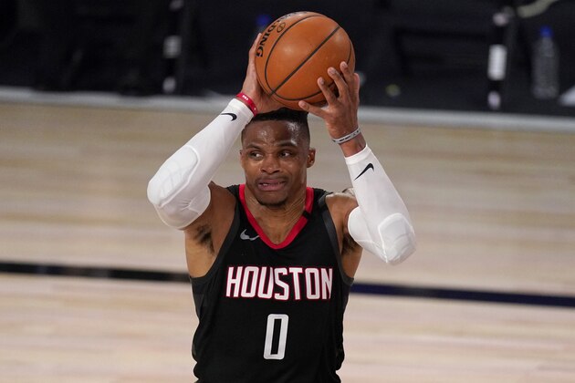 Houston Rockets' Russell Westbrook (0) looks to make a pass during the second half of an NBA first-round playoff basketball game against the Oklahoma City Thunder in Lake Buena Vista, Fla., Wednesday, Sept. 2, 2020. (AP Photo/Mark J. Terrill)