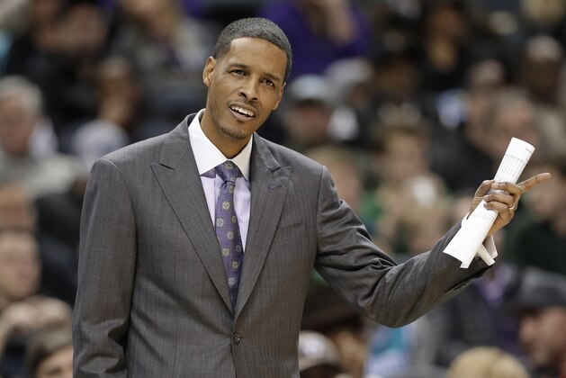Charlotte Hornets associate head coach Stephen Silas argues a call during the first half of an NBA basketball game against the Boston Celtics in Charlotte, N.C., Wednesday, Dec. 27, 2017. (AP Photo/Chuck Burton)