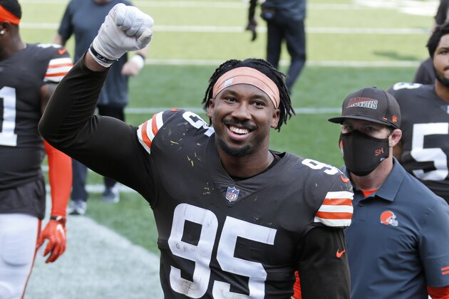 Cleveland Browns defensive end Myles Garrett celebrates after the Browns defeated the Washington Football Team in an NFL football game, Sunday, Sept. 27, 2020, in Cleveland. (AP Photo/Ron Schwane)