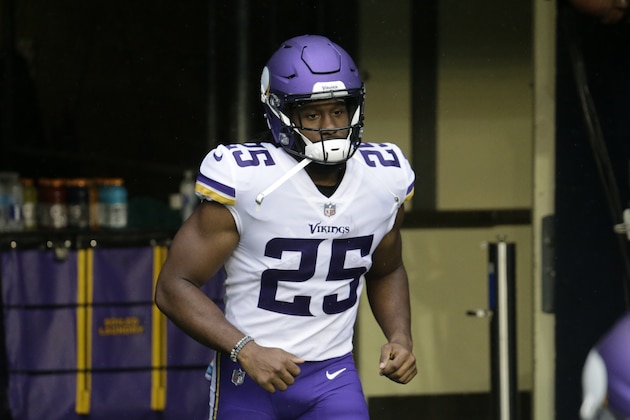 Minnesota Vikings' Alexander Mattison runs onto the field before an NFL football game against the Seattle Seahawks, Sunday, Oct. 11, 2020, in Seattle. (AP Photo/John Froschauer)