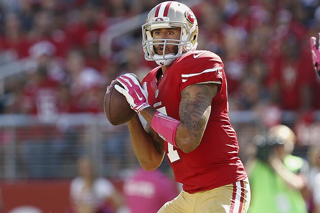 San Francisco 49ers quarterback Colin Kaepernick (7) passes against the Kansas City Chiefs during the first half of an NFL football game in Santa Clara, Calif., Sunday, Oct. 5, 2014. (AP Photo/Tony Avelar)