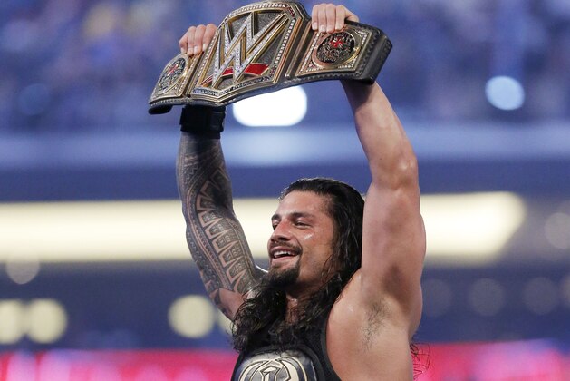 IMAGE DISTRIBUTED FOR WWE - WWE superstar new world heavy weight champion Roman Reigns celebrates his victory at WrestleMania 32 at AT&T Stadium on Sunday, April 3, 2016, in Arlington, Texas. (Brandon Wade/AP Images for WWE) IMAGE DISTRIBUTED FOR WWE - WWE superstar new world heavy weight champion Roman Reigns celebrates his victory at WrestleMania 32 at AT&T Stadium on Sunday, April 3, 2016, in Arlington, Texas. (Brandon Wade/AP Images for WWE)