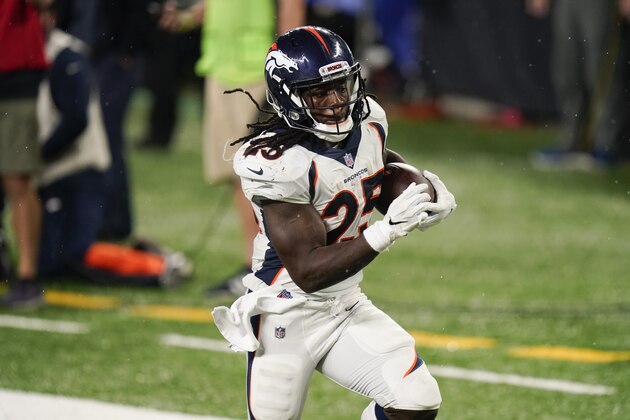 Denver Broncos running back Melvin Gordon (25) runs for a touchdown during the second half of an NFL football game Thursday, Oct. 1, 2020, in East Rutherford, N.J. (AP Photo/Seth Wenig)