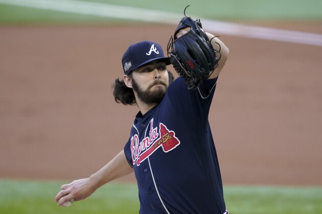 Atlanta Braves starting pitcher Ian Anderson throws against the Los Angeles Dodgers during the first inning in Game 2 of a baseball National League Championship Series Tuesday, Oct. 13, 2020, in Arlington, Texas. (AP Photo/Tony Gutierrez)