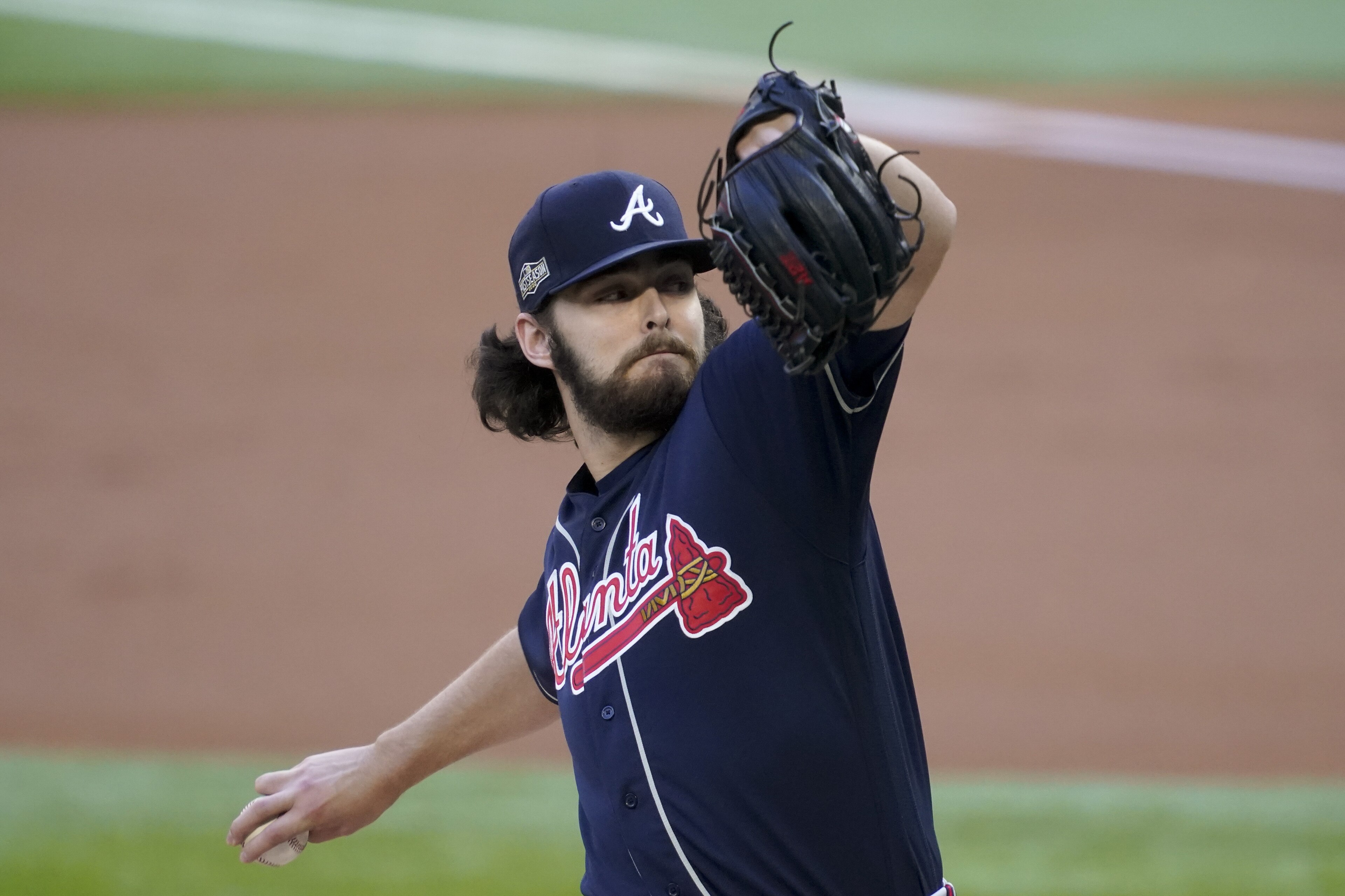 Atlanta Braves starting pitcher Ian Anderson throws against the Los Angeles Dodgers during the first inning in Game 2 of a baseball National League Championship Series Tuesday, Oct. 13, 2020, in Arlington, Texas. (AP Photo/Tony Gutierrez)