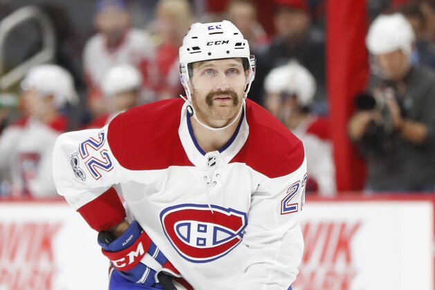 Montreal Canadiens defenseman Karl Alzner (22) plays against the Detroit Red Wings in the first period of an NHL hockey game Thursday, Nov. 30, 2017, in Detroit. (AP Photo/Paul Sancya)