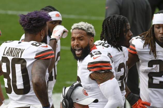 Cleveland Browns wide receiver Odell Beckham Jr. (13), center, yells to teammates on the sideline during the first half of an NFL football game against the Pittsburgh Steelers, Sunday, Oct. 18, 2020, in Pittsburgh. (AP Photo/Don Wright)