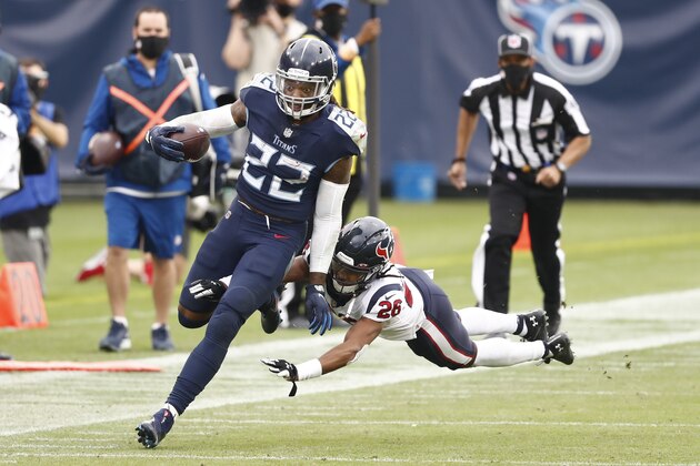 El running back Derrick Henry (22) de los Titans de Tennessee esquiva al cornerback Vernon Hargreaves de los Texans de Houston rumbo a anotar un touchdown, el domingo 18 de octubre de 2020. (AP Foto/Wade Payne) El running back Derrick Henry (22) de los Titans de Tennessee esquiva al cornerback Vernon Hargreaves de los Texans de Houston rumbo a anotar un touchdown, el domingo 18 de octubre de 2020. (AP Foto/Wade Payne)