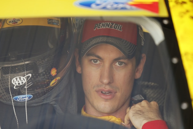 Sprint Cup Series driver Joey Logano (22) prepares for practice for Sunday's Sprint Cup auto race at Martinsville Speedway in Martinsville, Va., Saturday, Oct. 29, 2016. (AP Photo/Steve Helber)