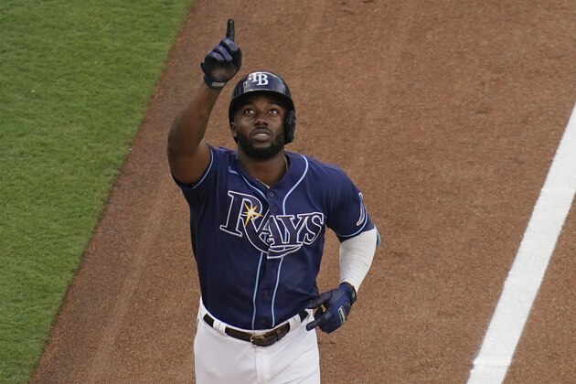 Tampa Bay Rays' Randy Arozarena reacts as he nears the plate after hitting a solo home run during the first inning in Game 2 of a baseball American League Division Series against the New York Yankees, Tuesday, Oct. 6, 2020, in San Diego. (AP Photo/Gregory Bull)