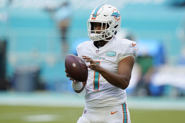Miami Dolphins quarterback Tua Tagovailoa (1) warm up before an NFL football game against the New York Jets, Sunday, Oct. 18, 2020, in Miami Gardens, Fla. (AP Photo/Lynne Sladky)