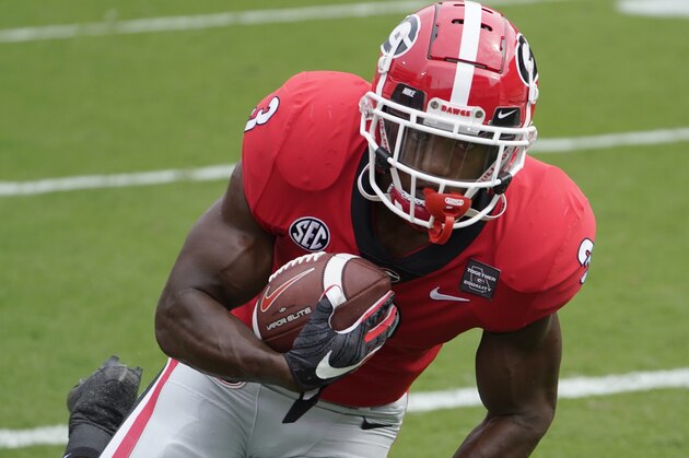 Georgia running back Zamir White (3) catches a pass during warm ups before an NCAA college football game against Tennessee Saturday, Oct. 10, 2020, in Athens, Ga. (AP Photo/John Bazemore) Georgia running back Zamir White (3) catches a pass during warm ups before an NCAA college football game against Tennessee Saturday, Oct. 10, 2020, in Athens, Ga. (AP Photo/John Bazemore)