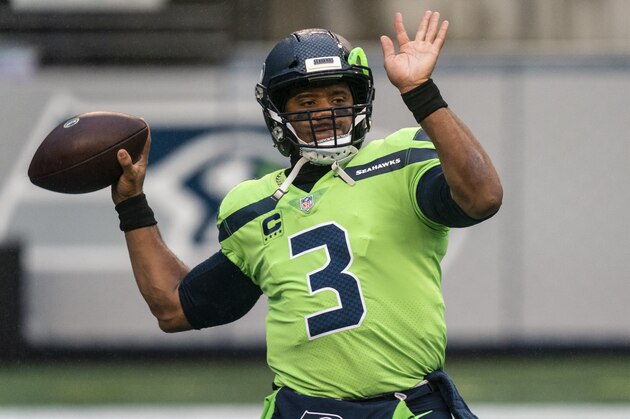 Seattle Seahawks quarterback Russell Wilson warms up before an NFL football game against the Minnesota Vikings, Sunday, Oct. 11, 2020, in Seattle. The Seahawks won 27-26. (AP Photo/Stephen Brashear)