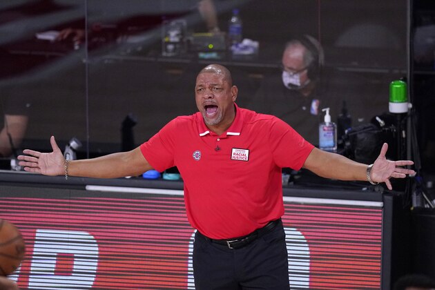Los Angeles Clippers head coach Doc Rivers yells during the first half of an NBA conference semifinal playoff basketball game against the Denver Nuggets Sunday, Sept. 13, 2020, in Lake Buena Vista, Fla. (AP Photo/Mark J. Terrill)