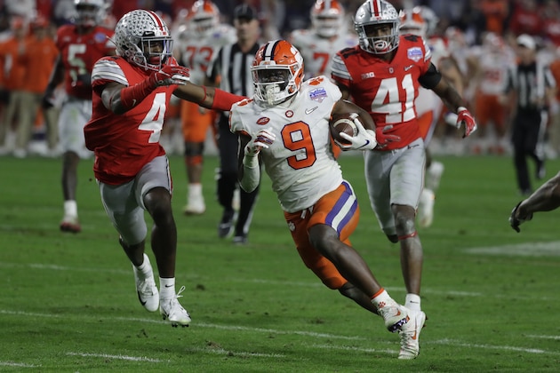 Clemson running back Travis Etienne (9) during the first half of the Fiesta Bowl NCAA college football game against Ohio State, Saturday, Dec. 28, 2019, in Glendale, Ariz. (AP Photo/Rick Scuteri).