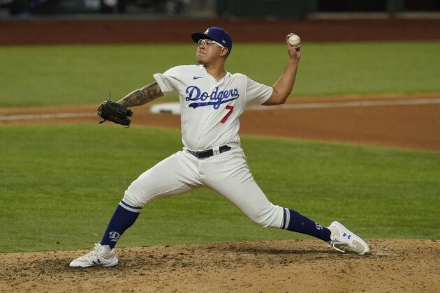 Los Angeles Dodgers starting pitcher Julio Urias throws against the Atlanta Braves during the sixth inning in Game 7 of a baseball National League Championship Series Sunday, Oct. 18, 2020, in Arlington, Texas. (AP Photo/Eric Gay)