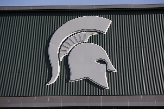 Michigan State's logo is seen on Spartan Stadium before the start of an NCAA college football game between Michigan State and Tulsa, Friday, Aug. 30, 2019, in East Lansing, Mich. (AP Photo/Al Goldis)