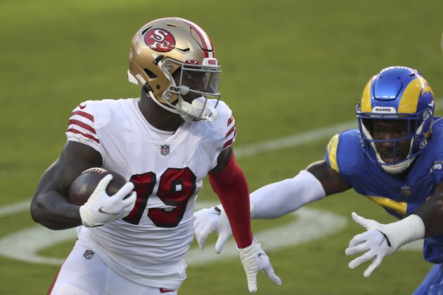 San Francisco 49ers wide receiver Deebo Samuel (19) runs after catching a pass to score a touchdown against the Los Angeles Rams during the first half of an NFL football game in Santa Clara, Calif., Sunday, Oct. 18, 2020. (AP Photo/Jed Jacobsohn)