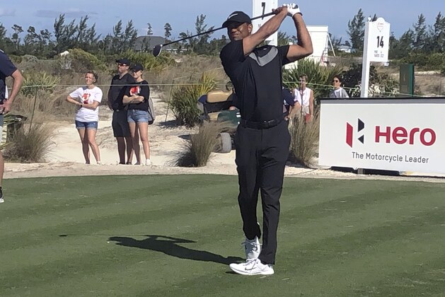 Tiger Woods hits 3-wood off the seventh tee at Albany Golf Club in the first round of the Hero World Challenge on Wednesday, Dec. 4, 2019, in Nassau, Bahamas. Woods used the opening round to pair several of his Presidents Cup players together. (AP Photo/Doug Ferguson)