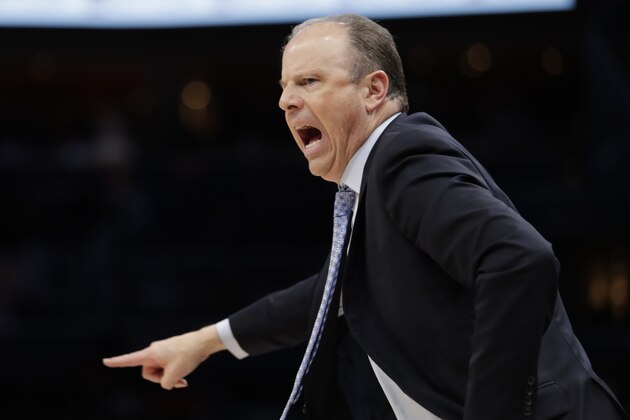 New York Knicks interim coach Mike Miller gestures during the second half of the team's NBA basketball game against the Washington Wizards, Tuesday, March 10, 2020, in Washington. (AP Photo/Luis M. Alvarez) New York Knicks interim coach Mike Miller gestures during the second half of the team's NBA basketball game against the Washington Wizards, Tuesday, March 10, 2020, in Washington. (AP Photo/Luis M. Alvarez)