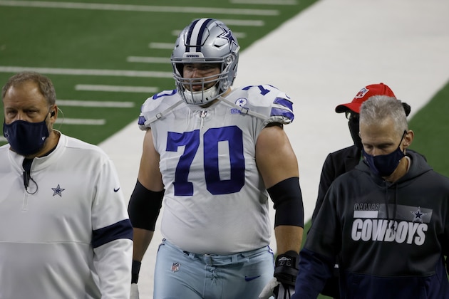 Dallas Cowboys guard Zack Martin (70) is escorted off the field after suffering an unknown injury in the first half of an NFL football game against the Arizona Cardinals in Arlington, Texas, Monday, Oct. 19, 2020. (AP Photo/Ron Jenkins) Dallas Cowboys guard Zack Martin (70) is escorted off the field after suffering an unknown injury in the first half of an NFL football game against the Arizona Cardinals in Arlington, Texas, Monday, Oct. 19, 2020. (AP Photo/Ron Jenkins)