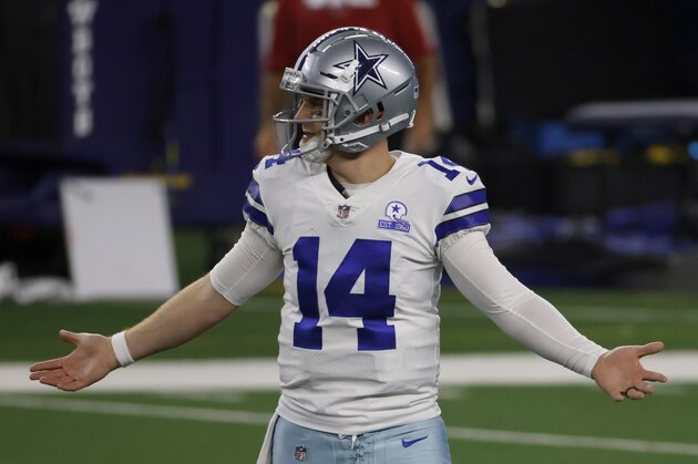 Dallas Cowboys quarterback Andy Dalton (14) gestures after throwing an interception in the second half of an NFL football game against the Arizona Cardinals in Arlington, Texas, Monday, Oct. 19, 2020. (AP Photo/Ron Jenkins)