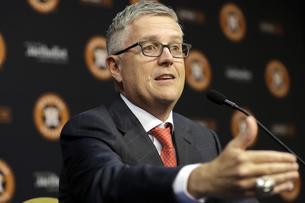 Houston Astros' Jeff Luhnow answers a question during a news conference to announce his promotion to President of Baseball Operations and General Manager Monday, June 18, 2018, in Houston. Luhnow's new contract runs through the 2023 season. (AP Photo/David J. Phillip)