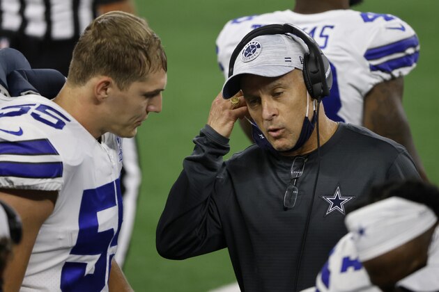 Dallas Cowboys linebacker Leighton Vander Esch (55) talks with defensive coordinator Mike Nolan, right, in the first half of an NFL football game against the Arizona Cardinals in Arlington, Texas, Monday, Oct. 19, 2020. (AP Photo/Ron Jenkins) Dallas Cowboys linebacker Leighton Vander Esch (55) talks with defensive coordinator Mike Nolan, right, in the first half of an NFL football game against the Arizona Cardinals in Arlington, Texas, Monday, Oct. 19, 2020. (AP Photo/Ron Jenkins)