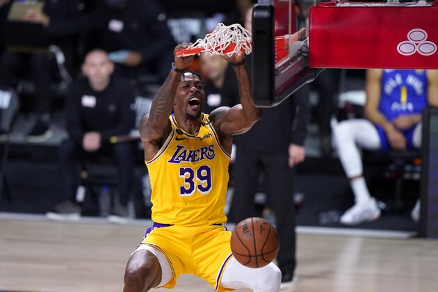Los Angeles Lakers center Dwight Howard (39) dunks the ball during the second half an NBA conference final playoff basketball game against the Denver Nuggets on Friday, Sept. 18, 2020, in Lake Buena Vista, Fla. (AP Photo/Mark J. Terrill)