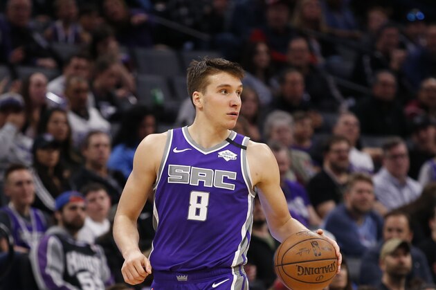 Sacramento Kings guard Bogdan Bogdanovic dribbles down court during the second half of an NBA basketball game against the Toronto Raptors in Sacramento, Calif., Sunday, March 8, 2020. The Raptors won 118-113. (AP Photo/Rich Pedroncelli)