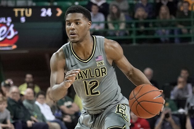 Baylor's Jared Butler (12) drives against Texas Tech during the first half of an NCAA college basketball game in Waco, Texas, Monday, March 2, 2020. (AP Photo/Chuck Burton)