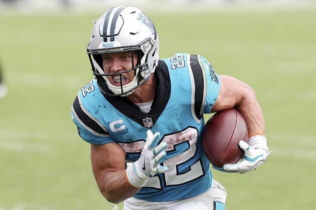 Carolina Panthers running back Christian McCaffrey (22) rushes for a touchdown against the Tampa Bay Buccaneers during the second half of an NFL football game Sunday, Sept. 20, 2020, in Tampa, Fla. The Panthers are eager to get Christian McCaffrey back on the field after he has missed four games with a high ankle sprain. (AP Photo/Mark LoMoglio) Carolina Panthers running back Christian McCaffrey (22) rushes for a touchdown against the Tampa Bay Buccaneers during the second half of an NFL football game Sunday, Sept. 20, 2020, in Tampa, Fla. The Panthers are eager to get Christian McCaffrey back on the field after he has missed four games with a high ankle sprain. (AP Photo/Mark LoMoglio)