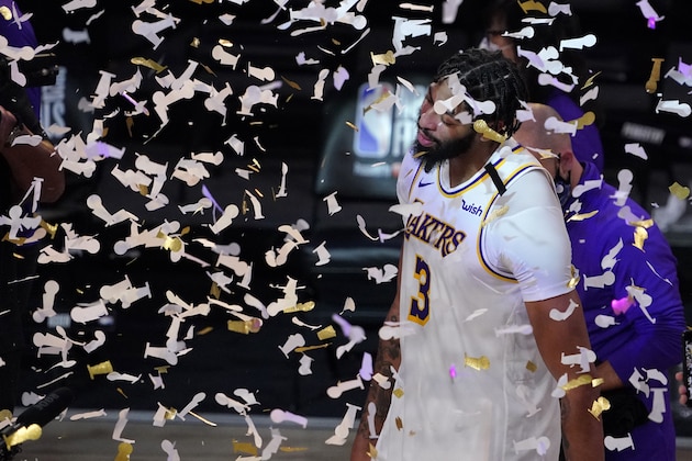 Los Angeles Lakers' Anthony Davis (3) celebrates after the Lakers defeated the Miami Heat 106-93 in Game 6 of basketball's NBA Finals Sunday, Oct. 11, 2020, in Lake Buena Vista, Fla. (AP Photo/Mark J. Terrill) Los Angeles Lakers' Anthony Davis (3) celebrates after the Lakers defeated the Miami Heat 106-93 in Game 6 of basketball's NBA Finals Sunday, Oct. 11, 2020, in Lake Buena Vista, Fla. (AP Photo/Mark J. Terrill)