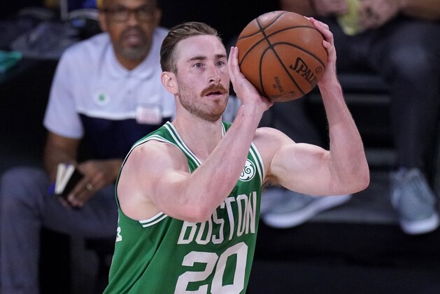 Boston Celtics' Gordon Hayward (20) attempts a shot during the second half of an NBA conference final playoff basketball game against the Miami Heat on Saturday, Sept. 19, 2020, in Lake Buena Vista, Fla. (AP Photo/Mark J. Terrill)
