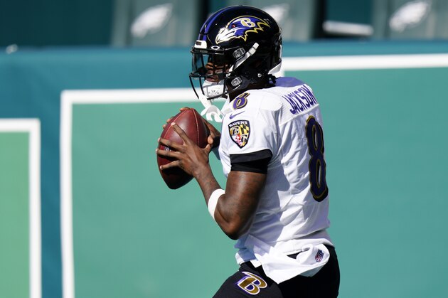 Baltimore Ravens' Lamar Jackson warms up before an NFL football game against the Philadelphia Eagles, Sunday, Oct. 18, 2020, in Philadelphia. (AP Photo/Chris Szagola)